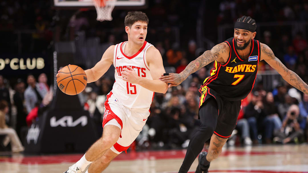 Jan 29, 2026; Atlanta, Georgia, USA; Houston Rockets guard Reed Sheppard (15) drives on Atlanta Hawks guard Nickeil Alexander-Walker (7) in the fourth quarter at State Farm Arena. Mandatory Credit: Brett Davis-Imagn Images Jan 29, 2026; Atlanta, Georgia, USA; Houston Rockets guard Reed Sheppard (15) drives on Atlanta Hawks guard Nickeil Alexander-Walker (7) in the fourth quarter at State Farm Arena. Mandatory Credit: Brett Davis-Imagn Images