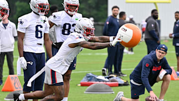 Jun 9, 2025; Foxborough, MA, USA; New England Patriots wide receiver Ja'Lynn Polk (1) works with a training aid during minicamp at Gillette Stadium. Mandatory Credit: Eric Canha-Imagn Images