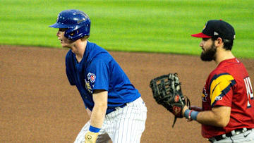 Iowa Cubs' Pete Crow-Armstrong inches toward second base during a game against the Toledo Mud Hens