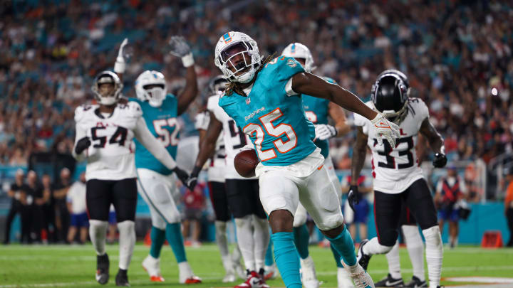 Aug 9, 2024; Miami Gardens, Florida, USA; Miami Dolphins running back Jaylen Wright (25) celebrates after scoring a touchdown against the Atlanta Falcons in the second quarter during preseason at Hard Rock Stadium. Mandatory Credit: Nathan Ray Seebeck-USA TODAY Sports