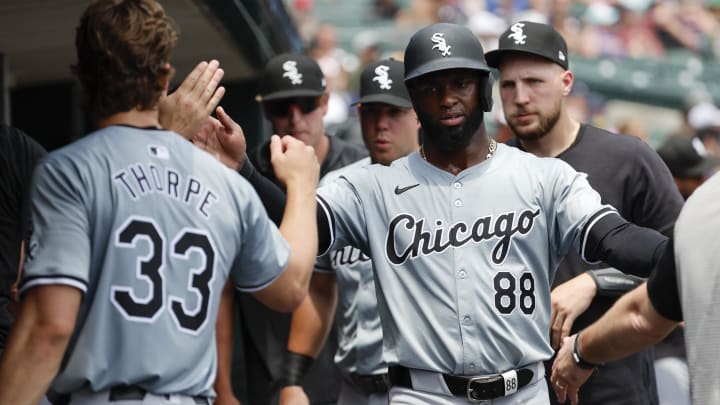 Jun 22, 2024; Detroit, Michigan, USA;  Chicago White Sox center fielder Luis Robert Jr. (88) receives congratulations from teammates after scoring in the fourth inning against the Detroit Tigers at Comerica Park. Mandatory Credit: Rick Osentoski-USA TODAY Sports