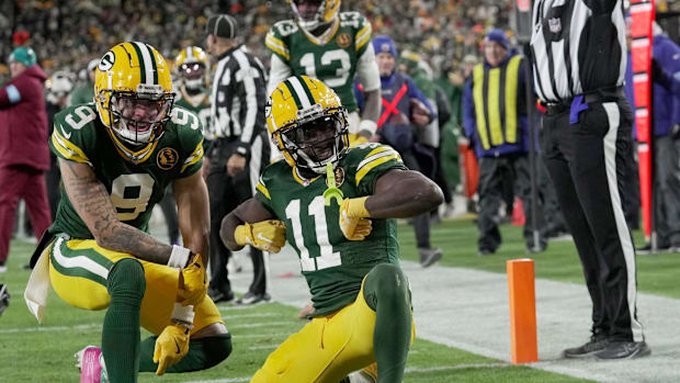 Christian Watson and Jayden Reed.