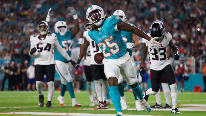 Miami Dolphins running back Jaylen Wright (25) celebrates after scoring a touchdown against the Atlanta Falcons in the second quarter during preseason at Hard Rock Stadium.