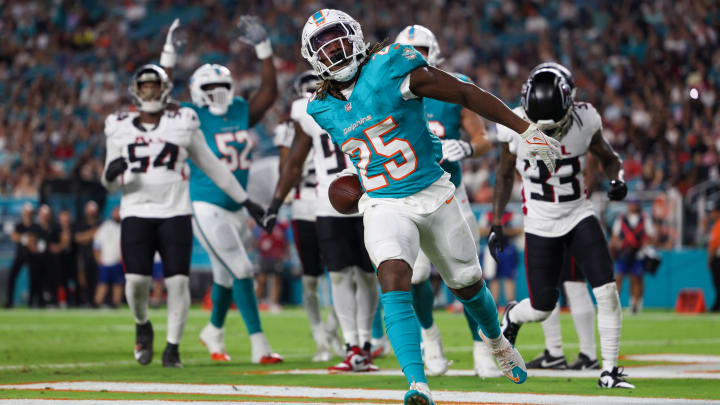 Aug 9, 2024; Miami Gardens, Florida, USA; Miami Dolphins running back Jaylen Wright (25) celebrates after scoring a touchdown against the Atlanta Falcons in the second quarter during preseason at Hard Rock Stadium. Mandatory Credit: Nathan Ray Seebeck-USA TODAY Sports