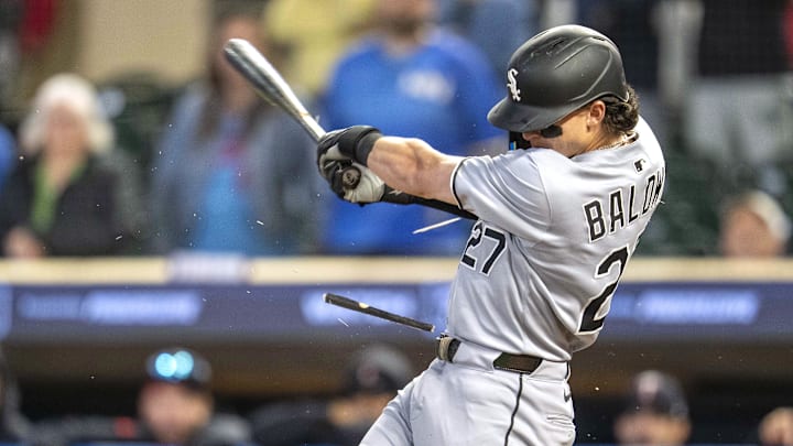Sep 3, 2025; Minneapolis, Minnesota, USA; Chicago White Sox right fielder Brooks Baldwin (27) hits a RBI single against the Minnesota Twins in the ninth inning at Target Field. Mandatory Credit: Jesse Johnson-Imagn Images