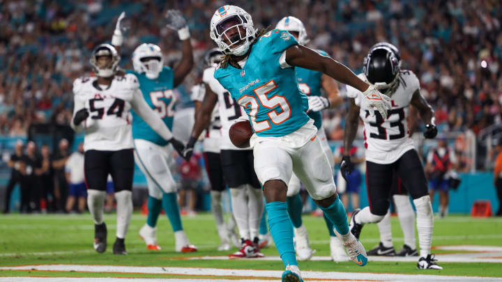 Aug 9, 2024; Miami Gardens, Florida, USA; Miami Dolphins running back Jaylen Wright (25) celebrates after scoring a touchdown against the Atlanta Falcons in the second quarter during preseason at Hard Rock Stadium. Mandatory Credit: Nathan Ray Seebeck-USA TODAY Sports