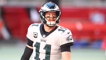 Dec 20, 2020; Glendale, Arizona, USA; Philadelphia Eagles quarterback Carson Wentz (11) reacts prior to the game against the Arizona Cardinals at State Farm Stadium.