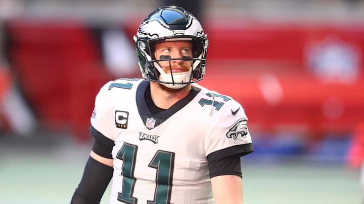 Dec 20, 2020; Glendale, Arizona, USA; Philadelphia Eagles quarterback Carson Wentz (11) reacts prior to the game against the Arizona Cardinals at State Farm Stadium.