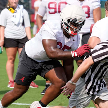 July 30, 2025; Tuscaloosa, AL, USA; Defensive lineman Steve Bolo Mboumoua runs in a drill during the first practice session of the preseason for the Alabama Crimson Tide.