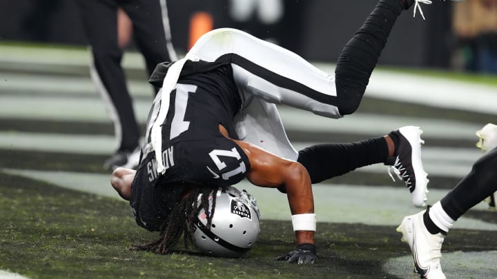 Sep 24, 2023; Paradise, Nevada, USA; Las Vegas Raiders wide receiver Davante Adams (17) scores a touchdown against the Pittsburgh Steelers during the first quarter at Allegiant Stadium. Mandatory Credit: Stephen R. Sylvanie-USA TODAY Sports