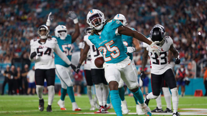 Aug 9, 2024; Miami Gardens, Florida, USA; Miami Dolphins running back Jaylen Wright (25) celebrates after scoring a touchdown against the Atlanta Falcons in the second quarter during preseason at Hard Rock Stadium. Mandatory Credit: Nathan Ray Seebeck-USA TODAY Sports