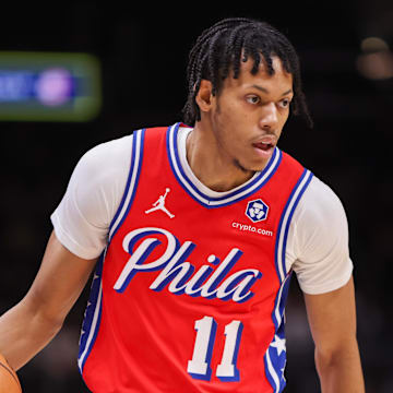Mar 23, 2025; Atlanta, Georgia, USA; Philadelphia 76ers guard Jeff Dowtin Jr. (11) dribbles against the Atlanta Hawks in the first quarter at State Farm Arena. Mandatory Credit: Brett Davis-Imagn Images