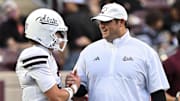Mississippi State Bulldogs head coach Jeff Lebby greets quarterback Blake Shapen (2) warms up prior to the game against the Texas A&M Aggies at Kyle Field.