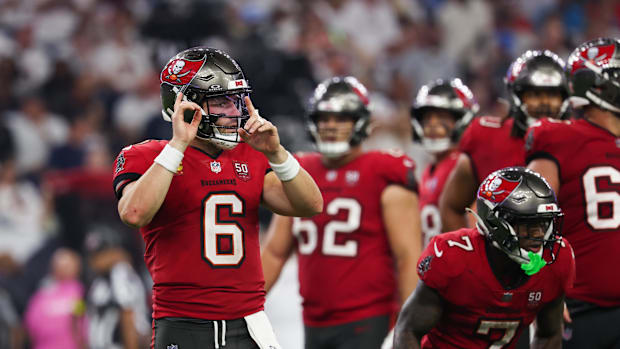 Baker Mayfield signals a play during a Tampa Bay Buccaneers game against the Houston Texans.