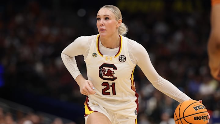 Apr 4, 2025; Tampa, FL, USA;  South Carolina Gamecocks forward Chloe Kitts (21) controls the ball against the Texas Longhorns during the third quarter in a semifinal of the women's 2025 NCAA tournament at Amalie Arena. Mandatory Credit: Nathan Ray Seebeck-Imagn Images
