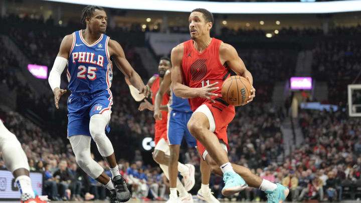 Jan 29, 2024; Portland, Oregon, USA; Portland Trail Blazers point guard Malcolm Brogdon (11) drives to the basket against Philadelphia 76ers small forward Danuel House Jr. (25) during the first half at Moda Center. Mandatory Credit: Soobum Im-USA TODAY Sports