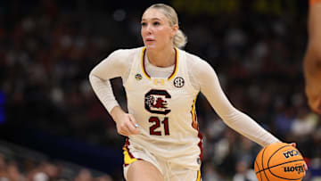 Apr 4, 2025; Tampa, FL, USA;  South Carolina Gamecocks forward Chloe Kitts (21) controls the ball against the Texas Longhorns during the third quarter in a semifinal of the women's 2025 NCAA tournament at Amalie Arena. Mandatory Credit: Nathan Ray Seebeck-Imagn Images