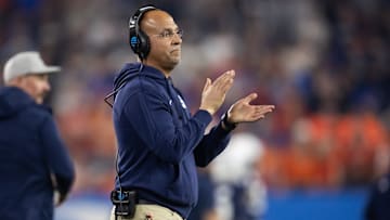 Dec 31, 2024; Glendale, AZ, USA; Penn State Nittany Lions head coach James Franklin reacts against the Boise State Broncos in the Fiesta Bowl at State Farm Stadium. Mandatory Credit: Mark J. Rebilas-Imagn Images