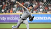 May 14, 2025; Houston, Texas, USA; Kansas City Royals starting pitcher Michael Lorenzen (24) pitches against the Houston Astros in the first inning at  Daikin Park. Mandatory Credit: Thomas Shea-Imagn Images