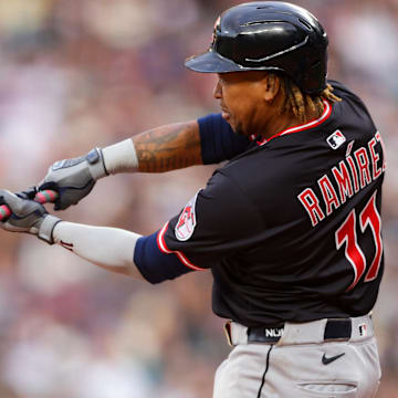 Jun 14, 2025; Seattle, Washington, USA; Cleveland Guardians third baseman José Ramírez (11) hits a home run during the fifth inning against the Seattle Mariners at T-Mobile Park. Mandatory Credit: Kevin Ng-Imagn Images