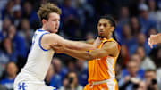 Feb 11, 2025; Lexington, Kentucky, USA; Kentucky Wildcats guard Travis Perry (11) and Tennessee Volunteers guard Zakai Zeigler (5) jostle for position during the first half at Rupp Arena at Central Bank Center. Mandatory Credit: Jordan Prather-Imagn Images