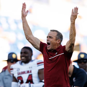 Sep 7, 2024; Lexington, Kentucky, USA; South Carolina Gamecocks head coach Shane Beamer celebrates during the fourth quarter against the Kentucky Wildcats at Kroger Field. Mandatory Credit: Jordan Prather-Imagn Images