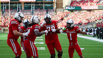 Aug 30, 2025; Lubbock, Texas, USA;  Members of the Texas Tech offense react after a touchdown against Arkansas-Pine Bluff Golden Lions in the first half at Jones AT&T Stadium. Mandatory Credit: Michael C. Johnson-Imagn Images