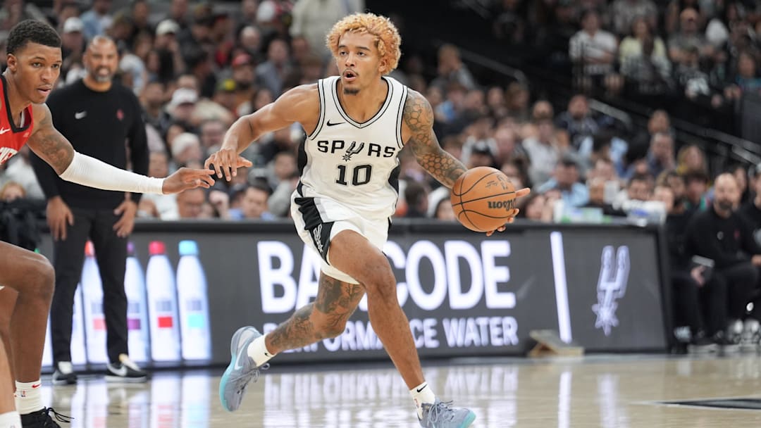 Oct 26, 2024; San Antonio, Texas, USA; San Antonio Spurs forward Jeremy Sochan (10) dribble the ball in the second half against the Houston Rockets at Frost Bank Center.