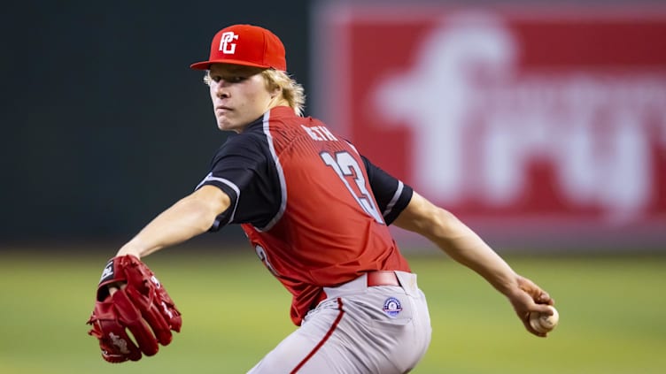 Aug 28, 2022; Phoenix, Arizona, US; West pitcher Zander Mueth (13) during the Perfect Game