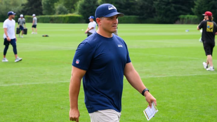 Jul 27, 2024; Renton, WA, USA; Seattle Seahawks head coach Michael Macdonald walks off the field after training camp at Virginia Mason Athletic Center. Mandatory Credit: Steven Bisig-USA TODAY Sports