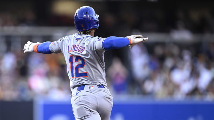 New York Mets shortstop Francisco Lindor (12) rounds the bases after hitting a grand slam home run against the San Diego Padres during the fourth inning at Petco Park on Aug 24.