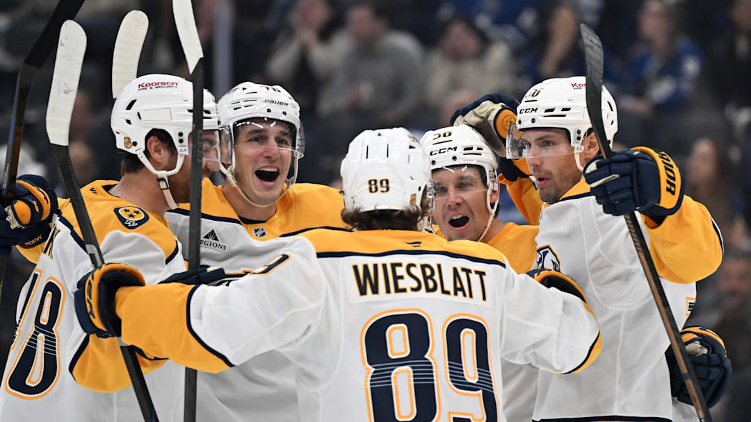 Oct 14, 2025; Toronto, Ontario, CAN;  Nashville Predators forward Erik Haula (56) celebrates with team mates after scoring a goal against the Toronto Maple Leafs in the second period at Scotiabank Arena. Mandatory Credit: Dan Hamilton-Imagn Images