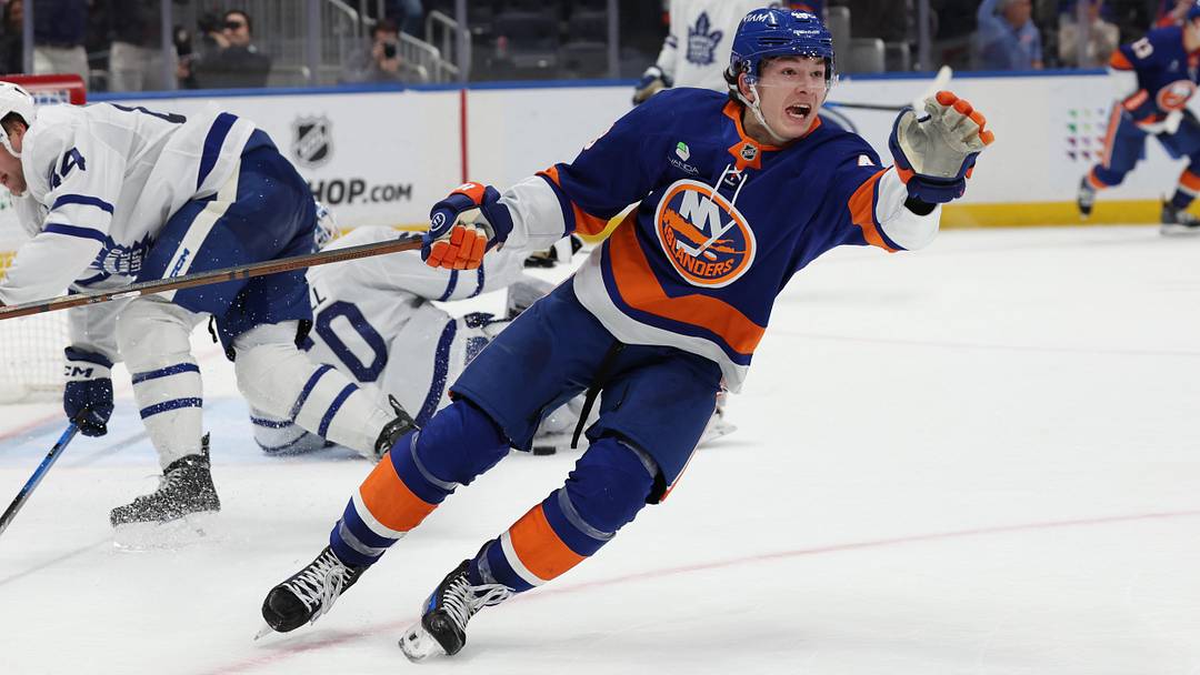 Jan 3, 2026; Elmont, New York, USA; New York Islanders defenseman Matthew Schaefer (48) celebrates after scoring the winning goal in overtime against the Toronto Maple Leafs at UBS Arena. Mandatory Credit: Thomas Salus-Imagn Images