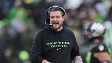 Oct 25, 2025; Eugene, Oregon, USA; Oregon Ducks head coach Dan Lanning instructs players during the first half against the Wisconsin Badgers at Autzen Stadium. Mandatory Credit: Troy Wayrynen-Imagn Images
