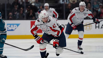 Mar 15, 2025; San Jose, California, USA;  Washington Capitals defenseman Martin Fehervary (42) advances the puck in the first period against the San Jose Sharks at SAP Center at San Jose. Mandatory Credit: David Gonzales-Imagn Images
