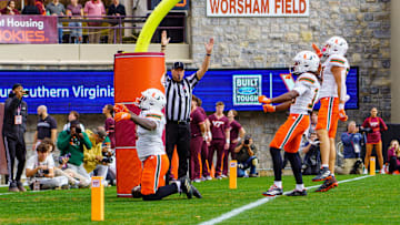 Nov 22, 2025; Blacksburg, Virginia, USA; Miami (FL) Hurricanes tight end Elija Lofton (9) celebrates after scoring a touchdown against the Virginia Tech Hokies during the first quarter at Lane Stadium. Mandatory Credit: Neville E. Guard-Imagn Images