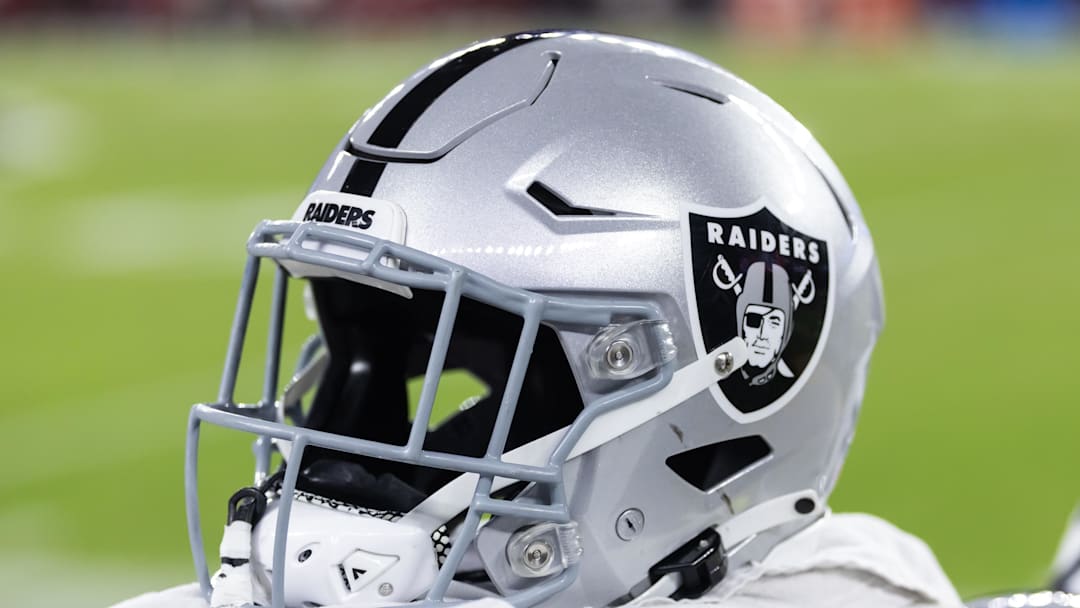 Aug 23, 2025; Glendale, Arizona, USA; Detailed view of a Las Vegas Raiders helmet during a preseason NFL game at State Farm Stadium. Mandatory Credit: Mark J. Rebilas-Imagn Images