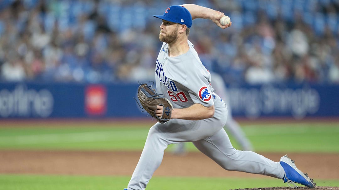 Aug 31, 2022; Toronto, Ontario, CAN; Chicago Cubs relief pitcher Rowan Wick (50) throws a pitch against the Toronto Blue Jays during the ninth inning at Rogers Centre. Mandatory Credit: Nick Turchiaro-Imagn Images