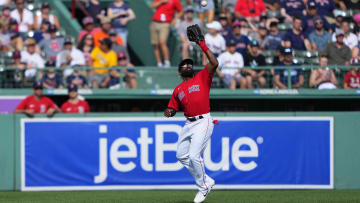 Jul 31, 2022; Boston, Massachusetts, USA; Boston Red Sox center fielder Jackie Bradley Jr. (19) catches a fly ball hit by Milwaukee Brewers catcher Victor Caratini (not pictured) during the ninth inning at Fenway Park.