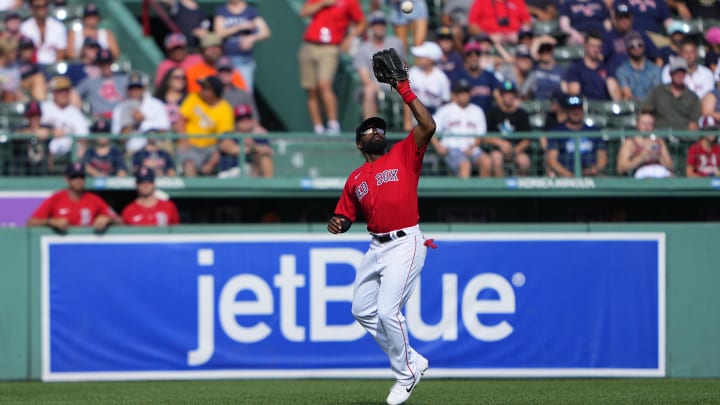 Jul 31, 2022; Boston, Massachusetts, USA; Boston Red Sox center fielder Jackie Bradley Jr. (19) catches a fly ball hit by Milwaukee Brewers catcher Victor Caratini (not pictured) during the ninth inning at Fenway Park.