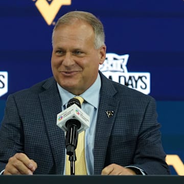 Jul 9, 2025; Frisco, TX, USA; West Virginia head coach Rich Rodriguez speaks with the media during 2025 Big 12 Football Media Days at The Star. Mandatory Credit: Raymond Carlin III-Imagn Images