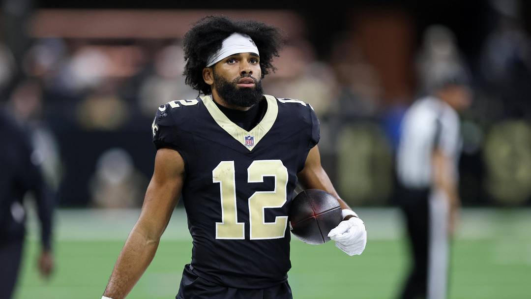 Oct 5, 2025; New Orleans, Louisiana, USA; New Orleans Saints wide receiver Chris Olave (12) walks on the sideline during the second half at Caesars Superdome. Mandatory Credit: Stephen Lew-Imagn Images