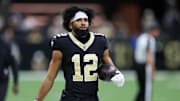 Oct 5, 2025; New Orleans, Louisiana, USA; New Orleans Saints wide receiver Chris Olave (12) walks on the sideline during the second half at Caesars Superdome. Mandatory Credit: Stephen Lew-Imagn Images