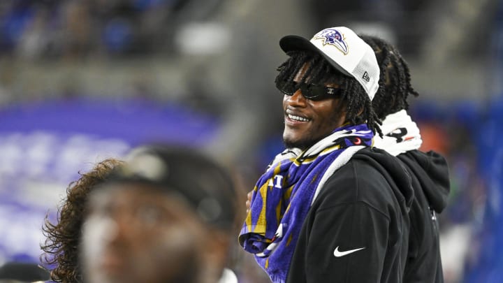 Aug 9, 2024; Baltimore, Maryland, USA; Baltimore Ravens quarterback Lamar Jackson  stands on the sidelines during the second half  of a preseason game against the Philadelphia Eagles at M&T Bank Stadium. Mandatory Credit: Tommy Gilligan-USA TODAY Sports