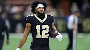 Oct 5, 2025; New Orleans, Louisiana, USA; New Orleans Saints wide receiver Chris Olave (12) walks on the sideline during the second half at Caesars Superdome. Mandatory Credit: Stephen Lew-Imagn Images