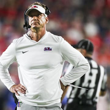 Nov 15, 2025; Oxford, Mississippi, USA; Mississippi Rebels head coach Lane Kiffin stands on the sideline during the first quarter against the Florida Gators at Vaught-Hemingway Stadium. Mandatory Credit: Petre Thomas-Imagn Images