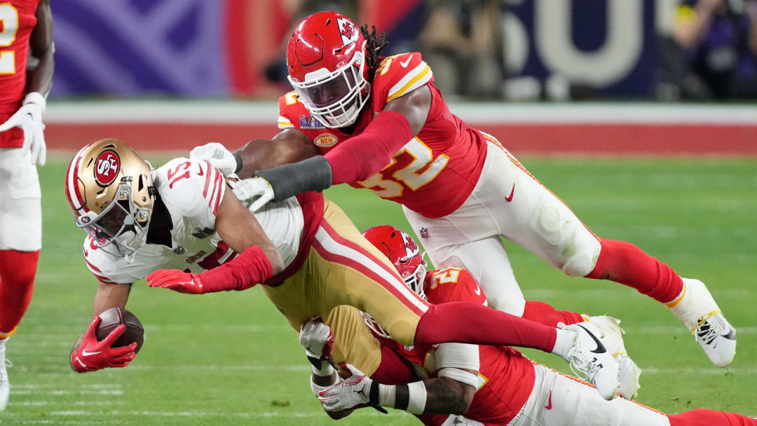 Feb 11, 2024; Paradise, Nevada, USA; Kansas City Chiefs safety Mike Edwards (21) and linebacker Nick Bolton (32) tackle San Francisco 49ers wide receiver Jauan Jennings (15) during the third quarter of Super Bowl LVIII at Allegiant Stadium. Mandatory Credit: Kyle Terada-USA TODAY Sports