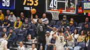 Feb 20, 2024; Morgantown, West Virginia, USA; UCF Knights forward Marchelus Avery (13) dunks the
