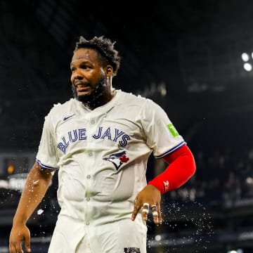 Toronto Blue Jays first base Vladimir Guerrero Jr. (27) wipes off Gatorade after defeating the New York Yankees at Rogers Centre. 