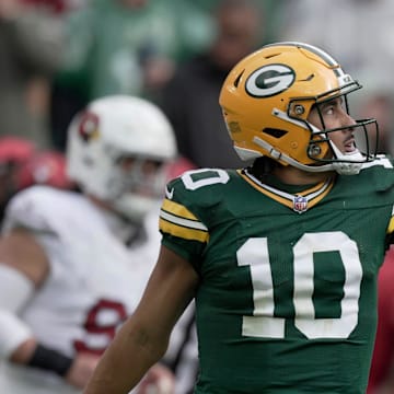 Green Bay Packers quarterback Jordan Love  signals first down during the fourth quarter of last year's game against the Cardinals.